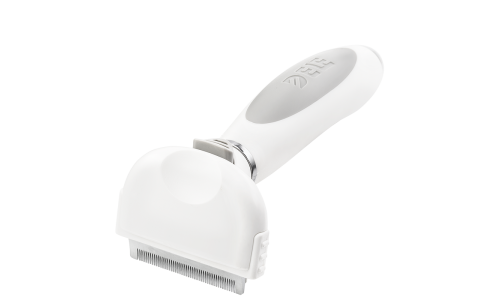 Kleine weiße Deshedding-Bürste für Hunde mit feinen Metallzähnen und ergonomischem Griff, zum Reduzieren von Haarausfall.